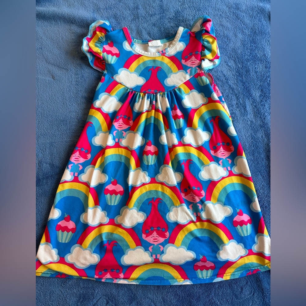 Girls Short ruffle sleved “princess Poppy” dress.